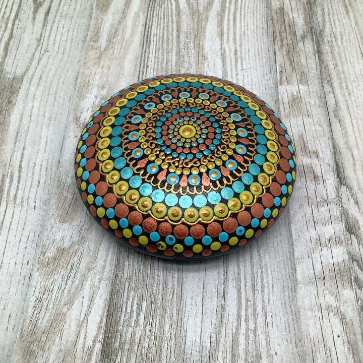 Mandala Steen in koper, turkoois en geel