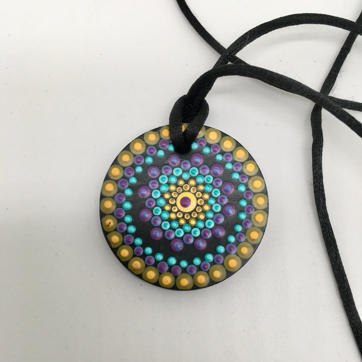 Mandala ketting in turquoise, paars en geel