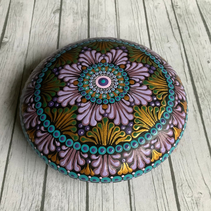 Decoratieve Steen Mandala Swooshes in roze en goud