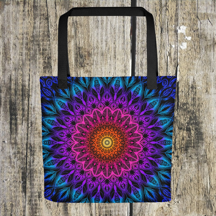 A vibrant mandala tote bag named 'Boho Fiesta' adorned with a lively mix of Orange, Pink, Purple, and Blue, exuding a festive and free-spirited vibe.