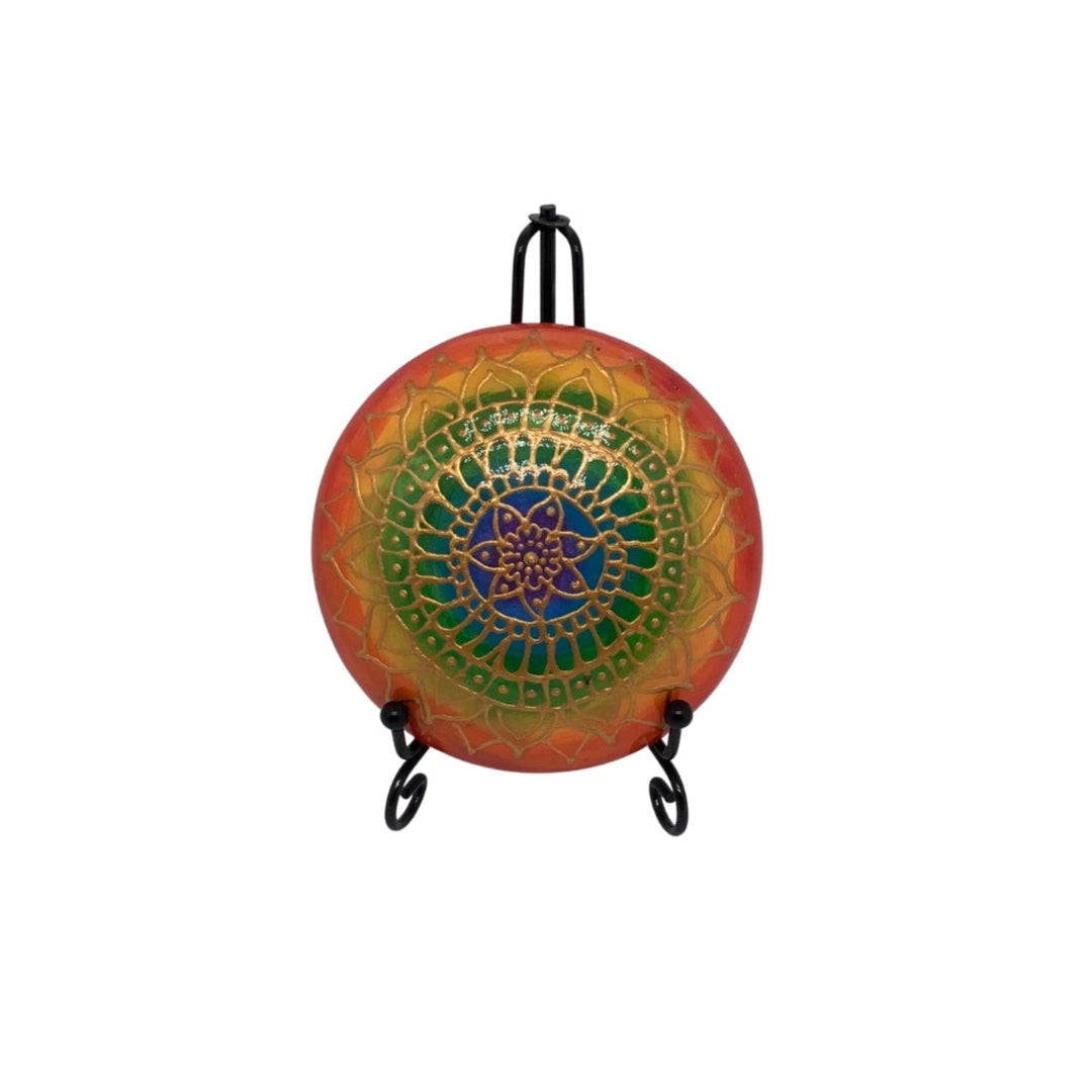 Round 10 cm mandala stone with vibrant patterns and a glossy resin coating, perfect for decor or meditation.