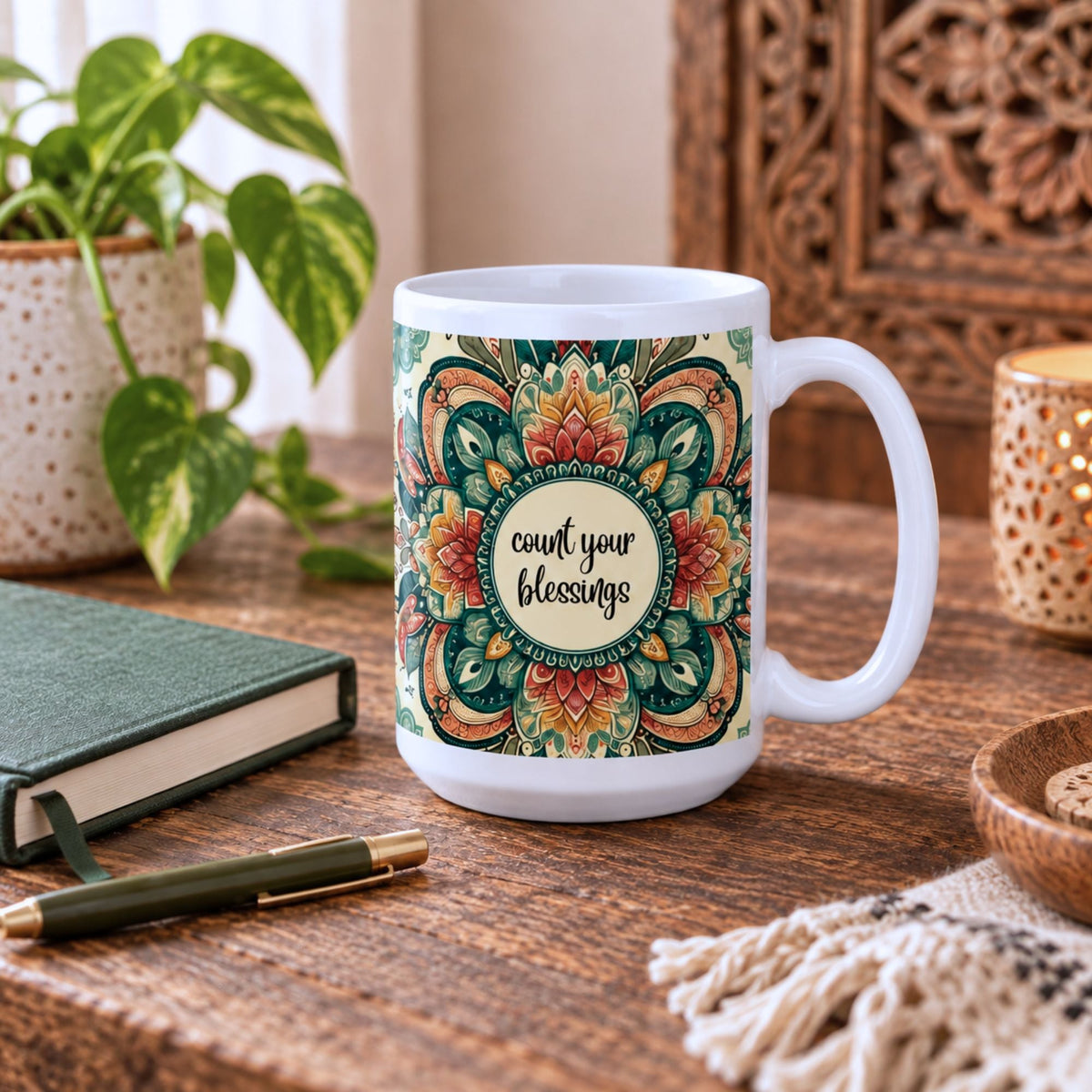 Mandala mug with count your blessings quote in a warm boho setting