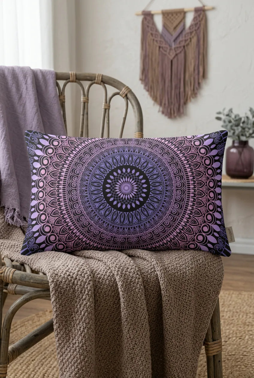 Boho lumbar pillow cover with purple mandala pattern styled on a rattan chair in a cozy boho interior