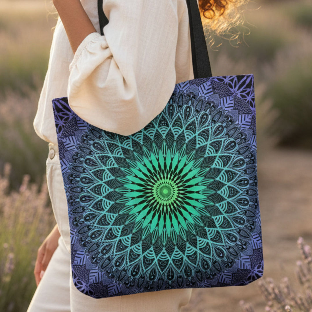 boho tote bag with green mandala design close up worn by woman in warm natural outdoor light
