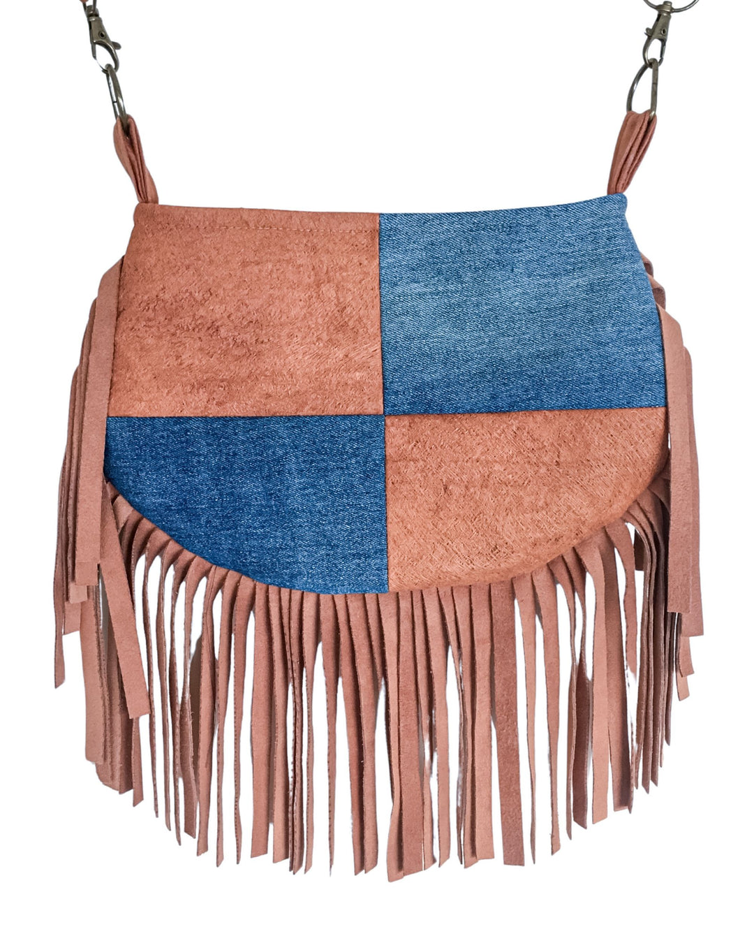 Brown and blue patchwork handbag with fringes on a white background