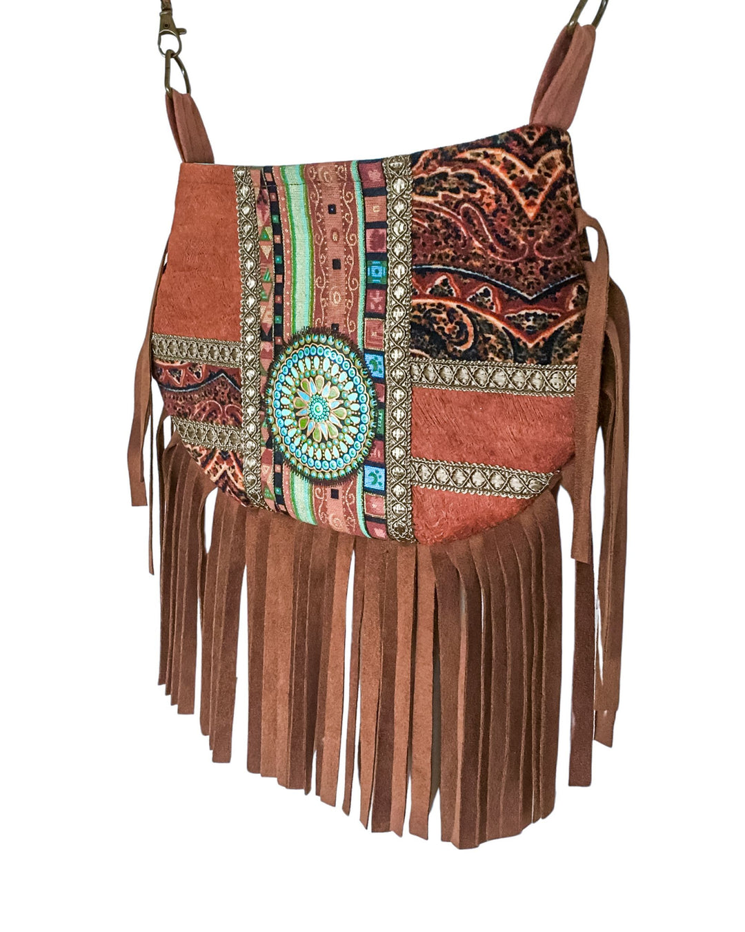 Bohemian-style handbag with colorful patterns and fringes on a white background
