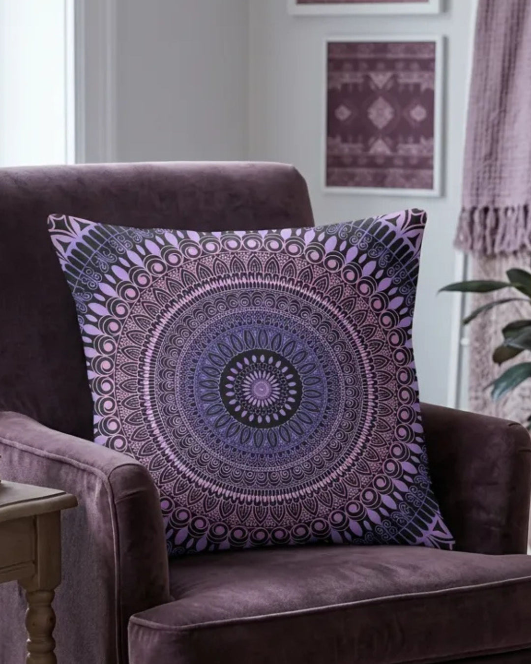 Boho mandala pillow cover in purple and lavender tones on a cozy armchair in a bohemian living room