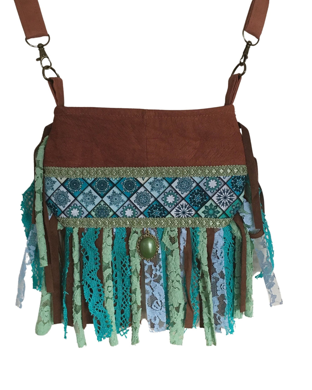 Brown bag with decorative pattern and fringes on a white background