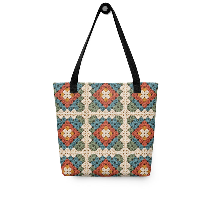 Front view of a printed granny square tote bag in teal, rust, sage, cream and mustard