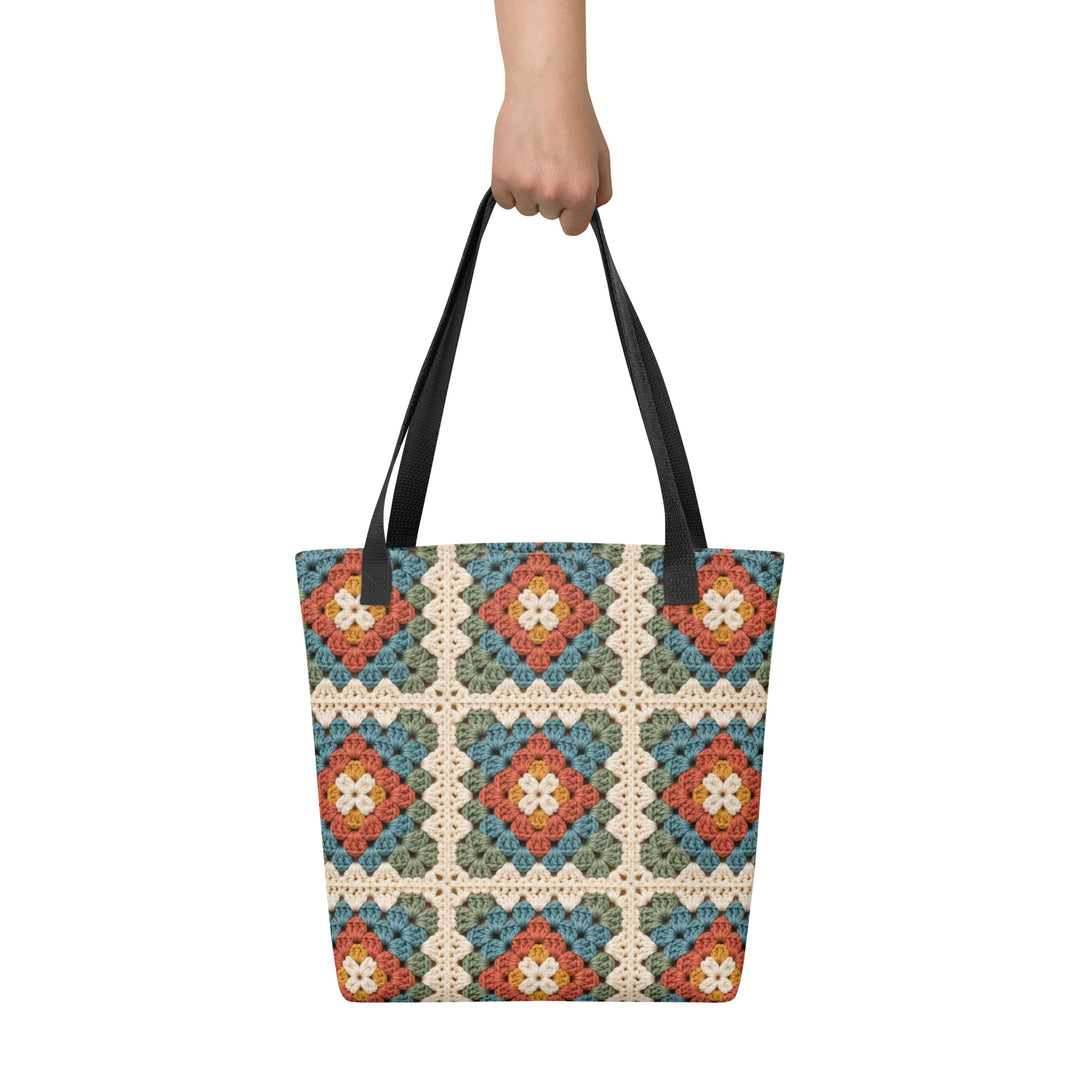 Printed retro boho tote bag with granny square pattern and black handles, front product view