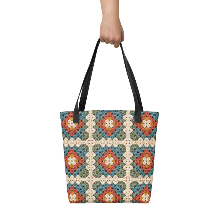 Printed retro boho tote bag with granny square pattern and black handles, front product view