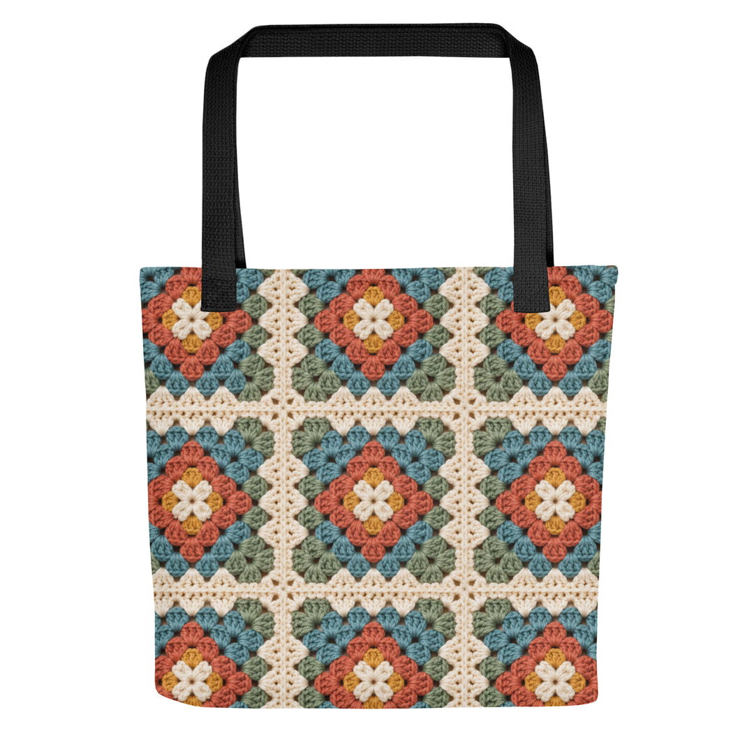 Printed granny square tote bag with black handles on a white background