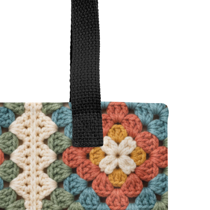 Close up product details of the printed granny square tote bag with black handles