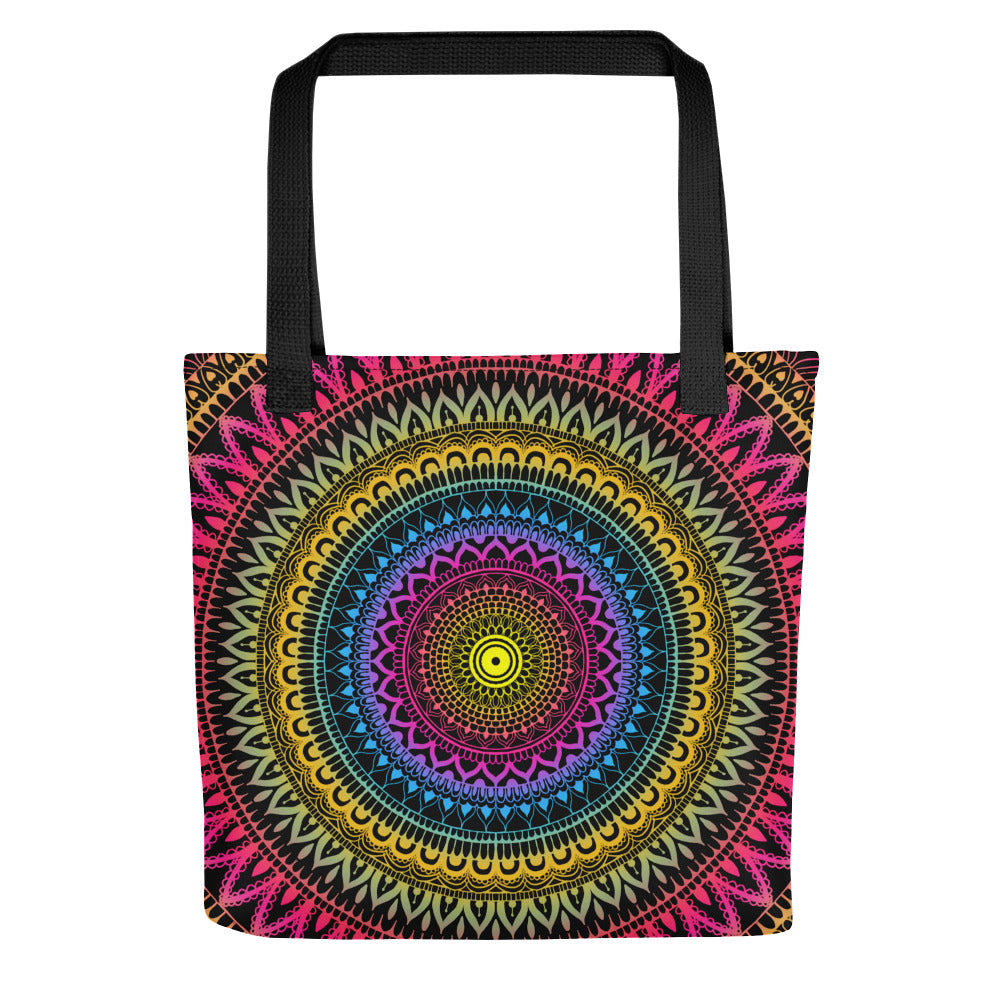 A tote bag with a vibrant multicolored mandala design on both sides.