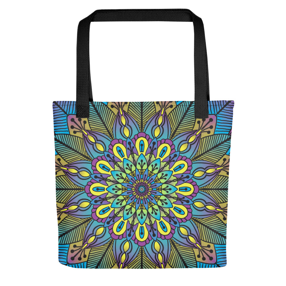 Colorful tote bag with a geometric mandala design in green, yellow and purple