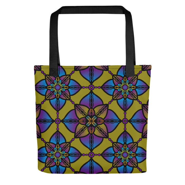 A tote bag featuring a vibrant mandala design with a geometric pattern in purple, blue, and yellow colors.