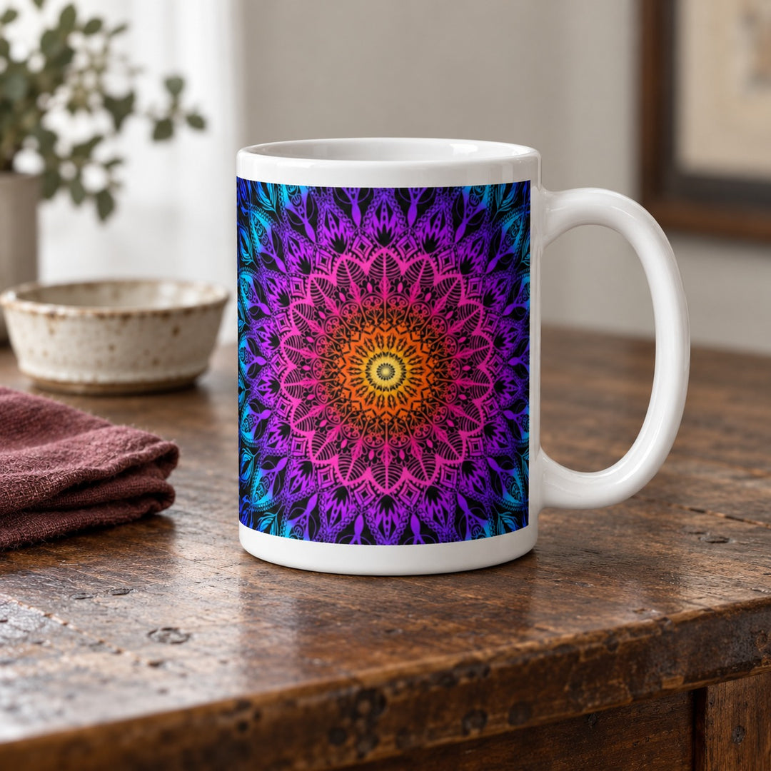 Colorful mug with orange pink purple and blue mandala 15 oz lifestyle photo on a rustic wooden table