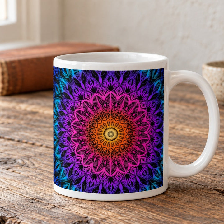 Colorful mug with orange pink purple and blue mandala close-up lifestyle photo on a rustic wooden table