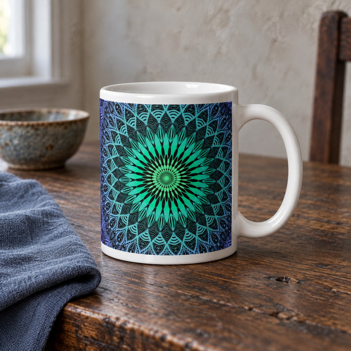Purple mug with mint green mandala design 11 oz lifestyle photo on a rustic wooden table