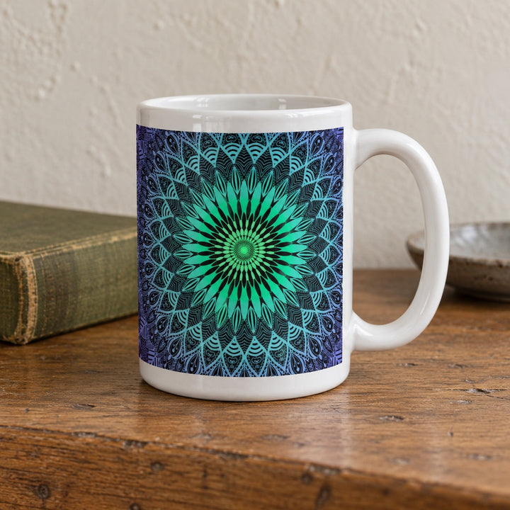 Purple mug with mint green mandala design 15 oz lifestyle photo on a rustic wooden table