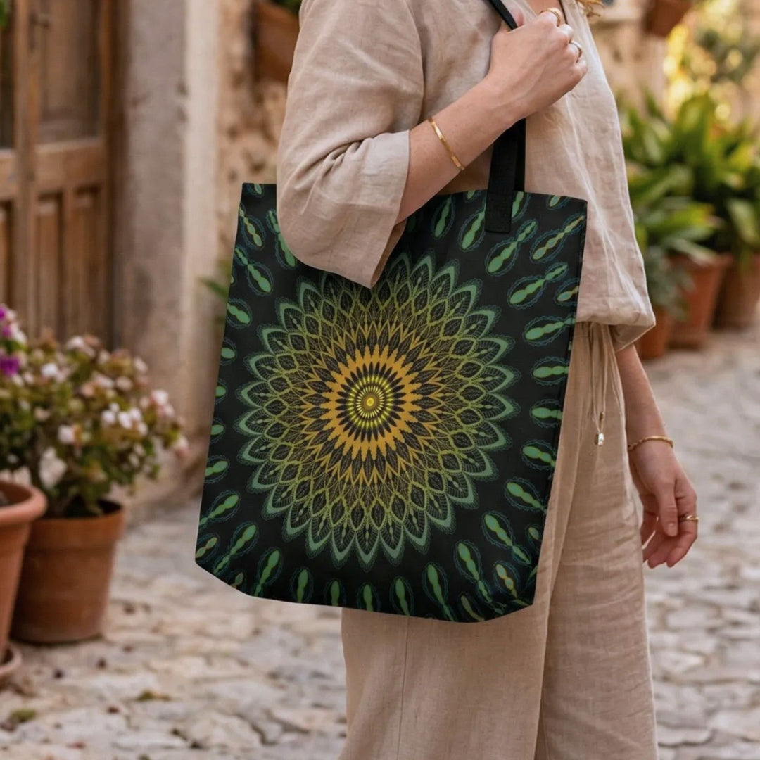 close up of green mandala tote bag with intricate pattern on canvas fabric worn with neutral boho clothing