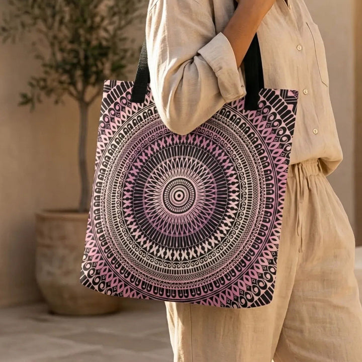 pink mandala tote bag close-up detail, boho pattern design, black and soft pink geometric print, canvas tote bag, high detail fabric texture