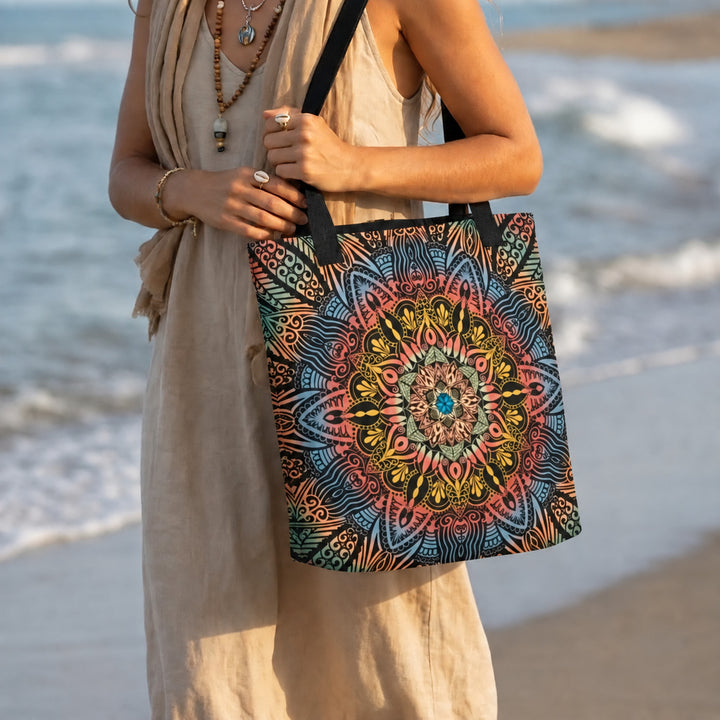 Colorful tote bag with psychedelic mandala boho print worn by a model