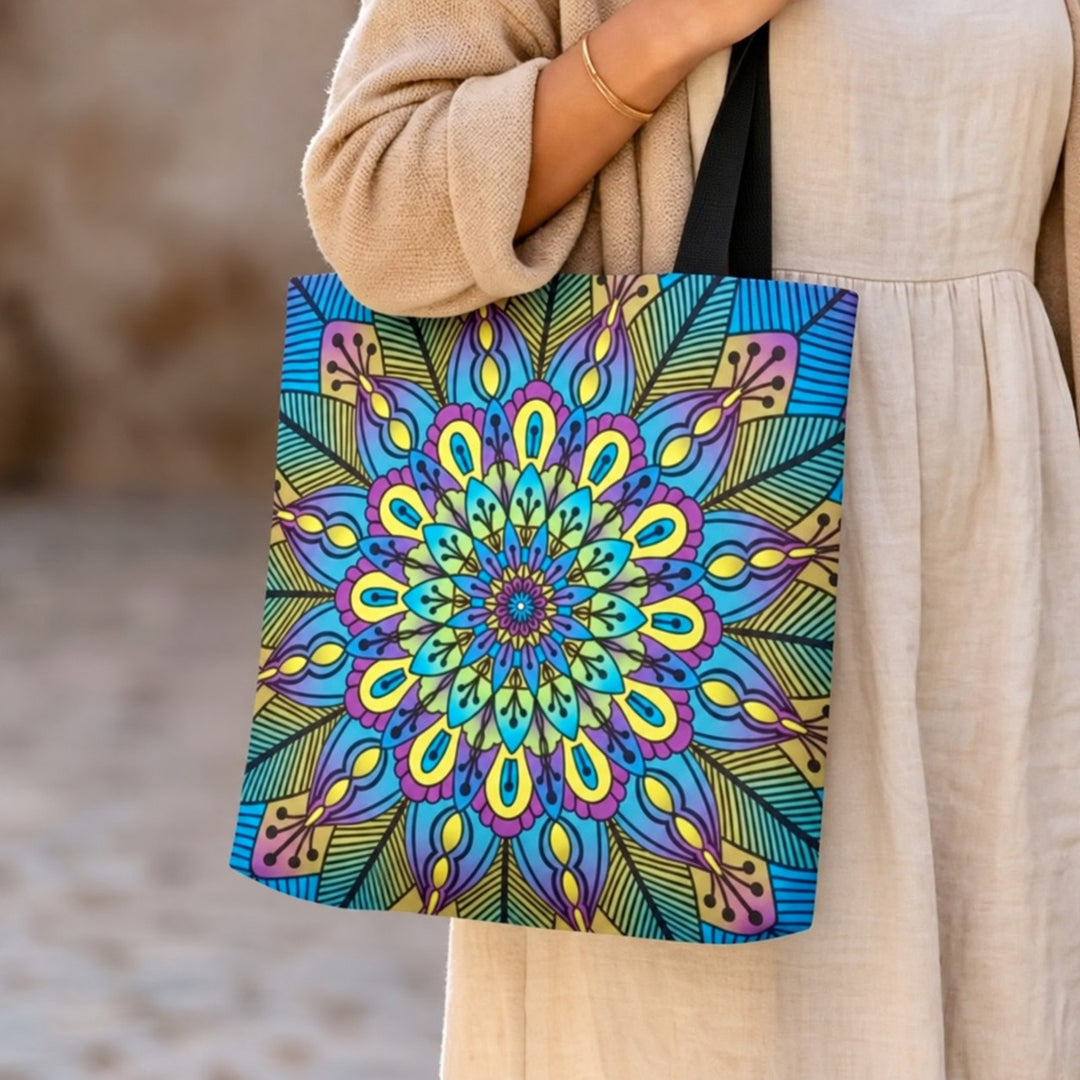 Floral tote bag with green yellow and purple mandala design worn by a model