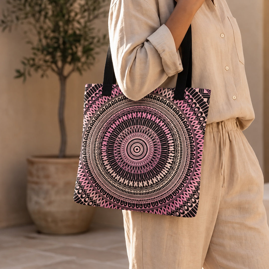 Light pink and beige mandala tote bag worn by a woman, close-up