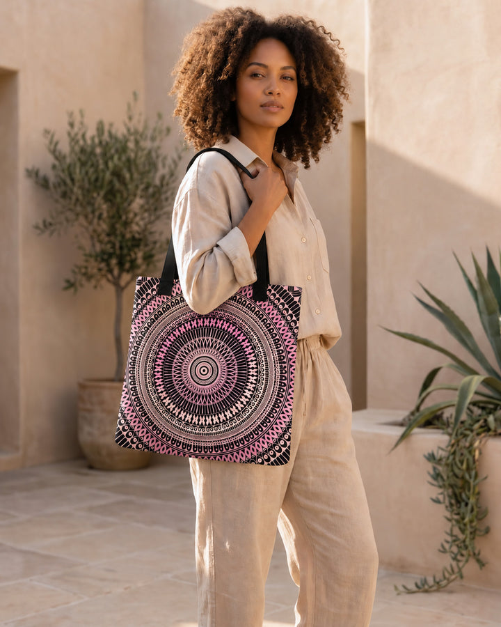 Light pink and beige mandala tote bag worn by a woman in a boho lifestyle setting