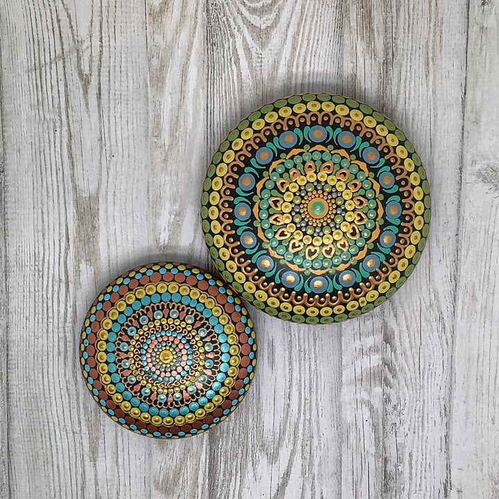 hand painted mandala stone in copper turquoise and yellow