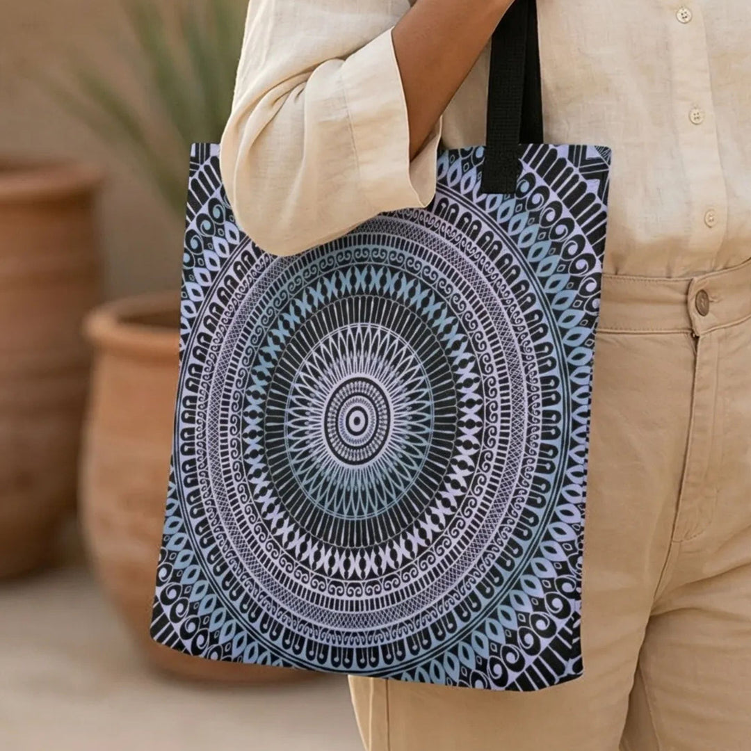 mandala tote bag worn by woman in neutral linen outfit, elegant boho style outdoor setting soft natural light