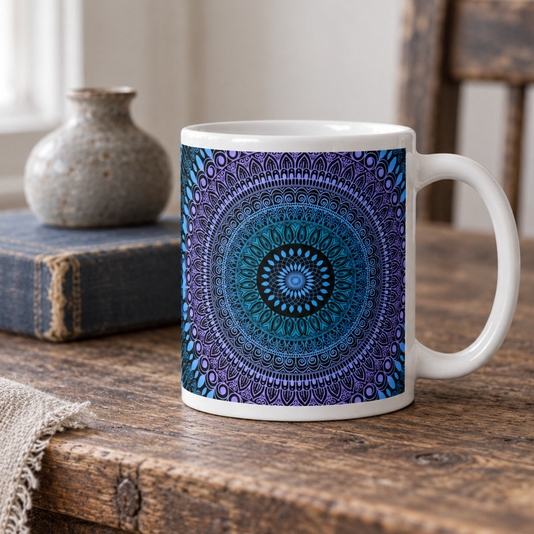 Colorful lavender blue and pink mandala mug close-up on a rustic wooden table