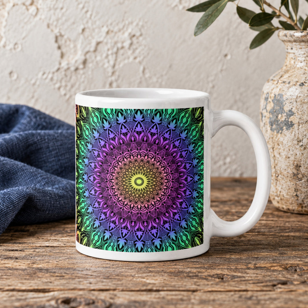 Colorful mug with bright boho mandala close-up on a rustic wooden table