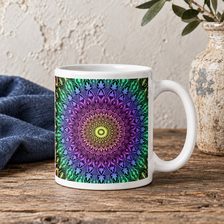 Colorful mug with bright boho mandala close-up on a rustic wooden table