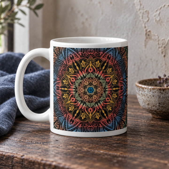 Close-up of psychedelic blue yellow and red mandala mug in a rustic boho setting