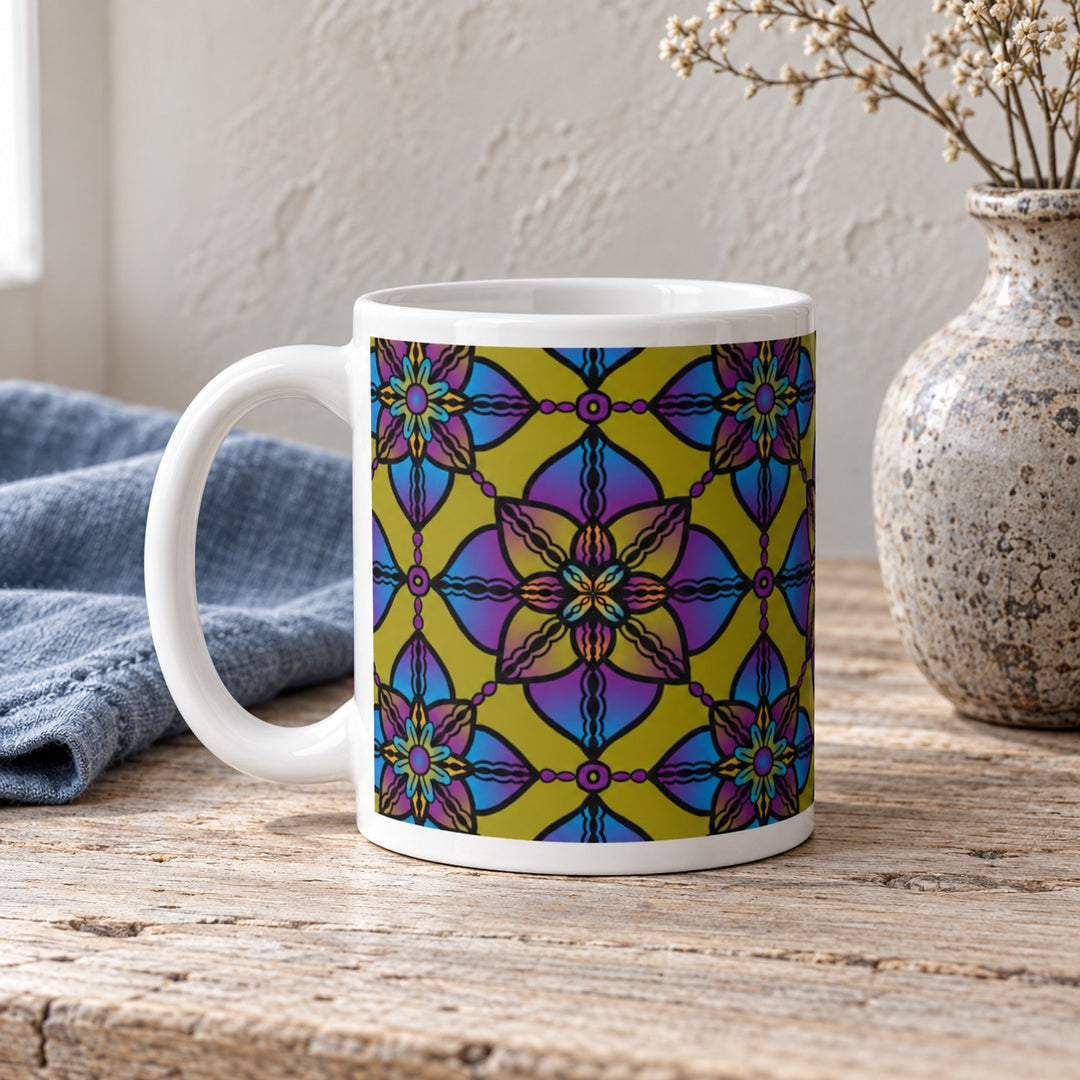11 oz colorful mandala mug styled on a rustic vintage wooden table