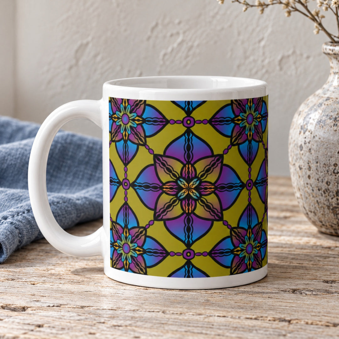 Close-up of purple blue and yellow mandala mug in a rustic boho setting