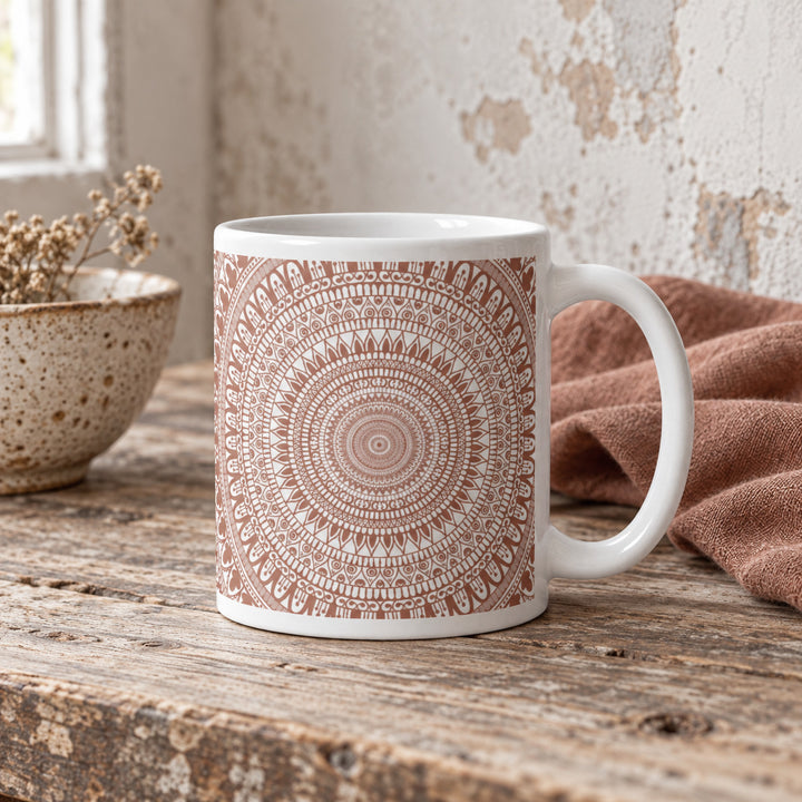 11 oz terracotta mandala mug styled on a rustic wooden table