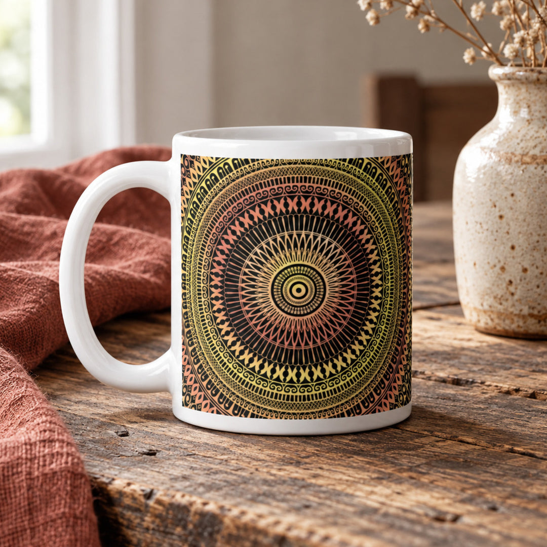 Close-up of yellow and soft orange mandala mug in a rustic boho setting