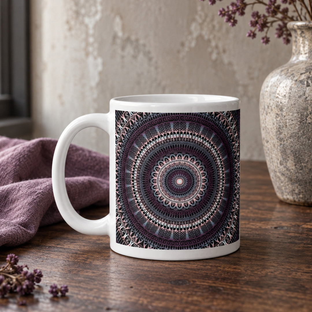 Close-up of gray and dark purple mandala mug in a rustic boho setting
