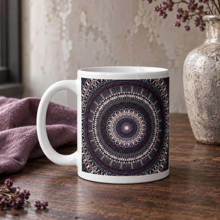 Close-up of gray and dark purple mandala mug in a rustic boho setting