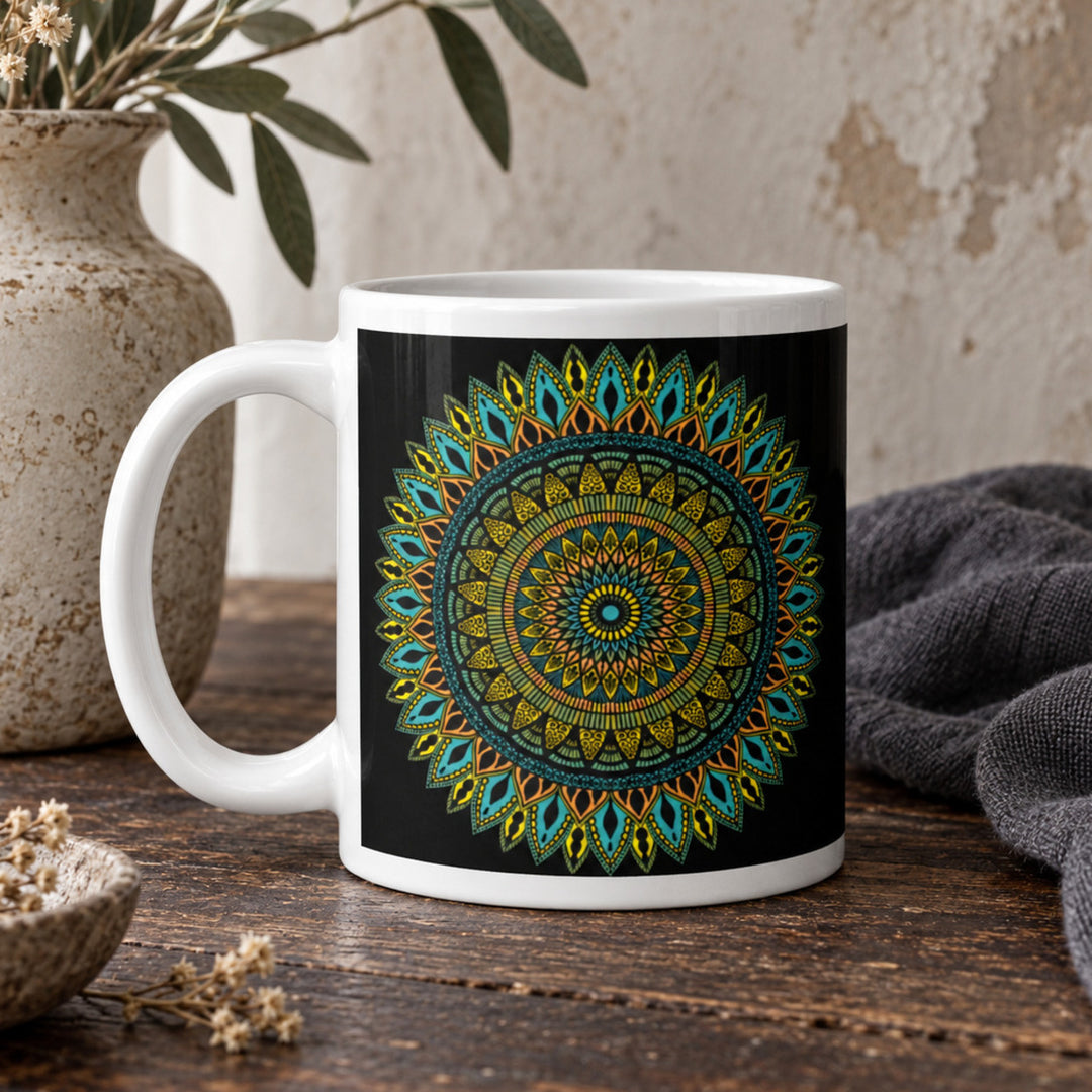 Close-up of Black Mug with Intricate Mandala Design in a rustic vintage setting