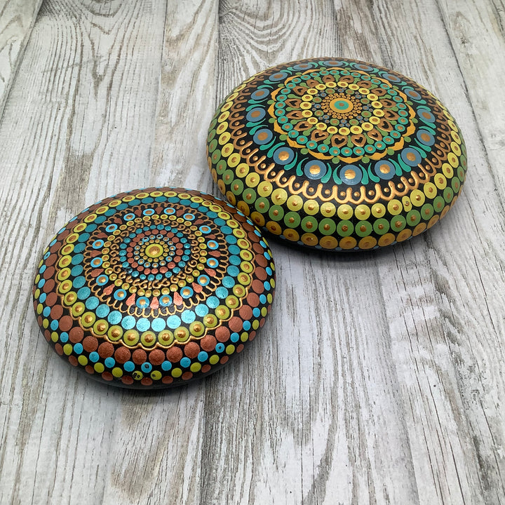 hand painted mandala stone in copper turquoise and yellow