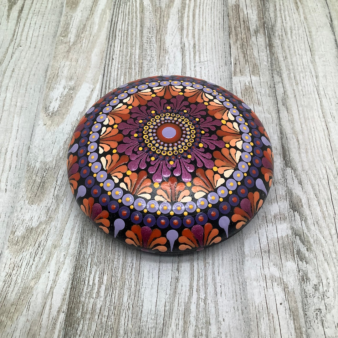 hand painted mandala stone in pink orange and lavender small