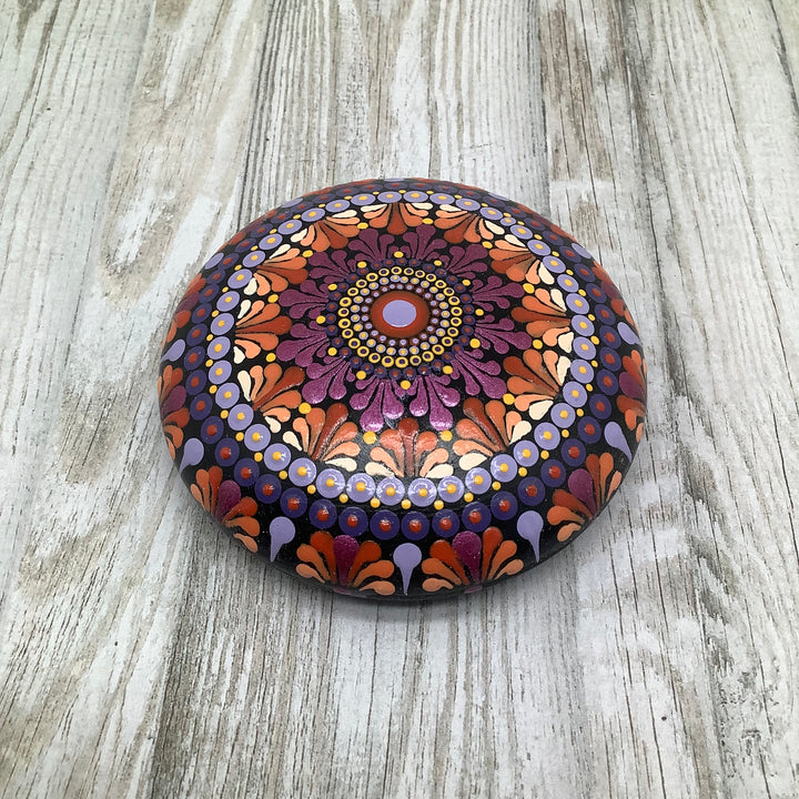 hand painted mandala stone in pink orange and lavender small