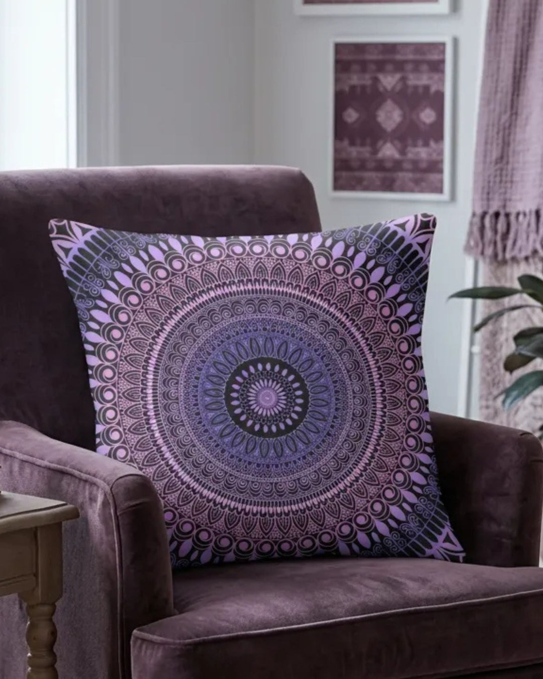 Boho mandala pillow cover in purple and lavender tones on a cozy armchair in a bohemian living room