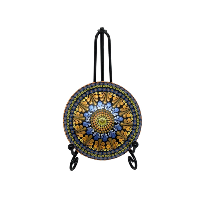 hand painted mandala stone in blue and gold